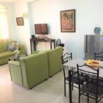 Exterior view of a cozy two-bedroom vacation rental house located in Gustilo, La Paz, Iloilo City, Philippines, featuring a welcoming facade and local neighborhood charm.