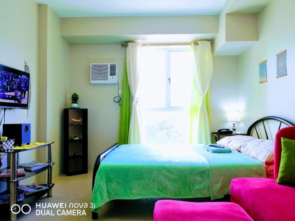 Cozy Condo Studio near Manila Airport w/ Unli Wifi