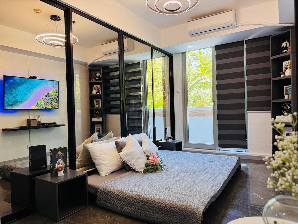 Deluxe Unit with Man Made Beach Pool – Azure, Manila, Philippines
