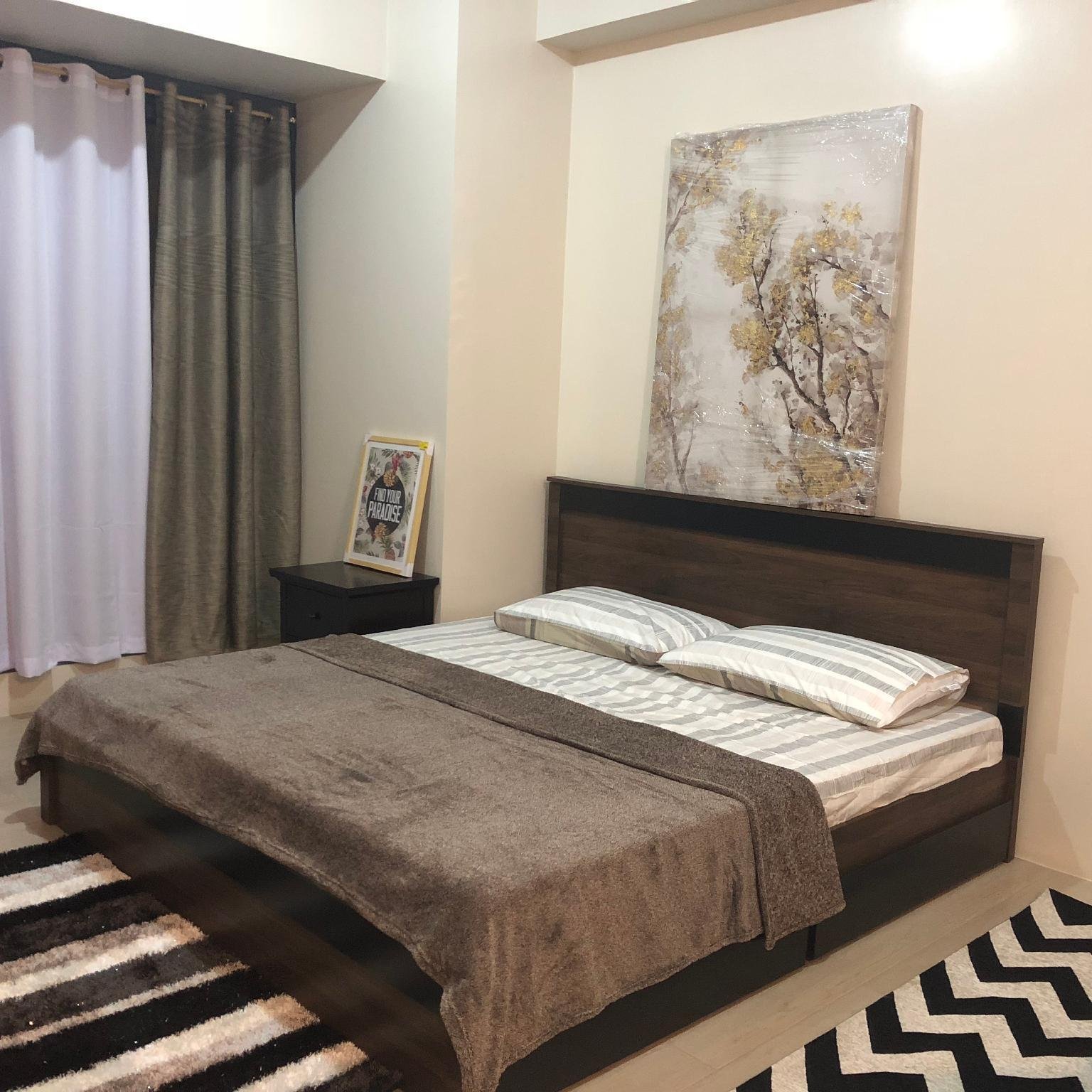 NAIA III Condotel besides Savoy Hotel