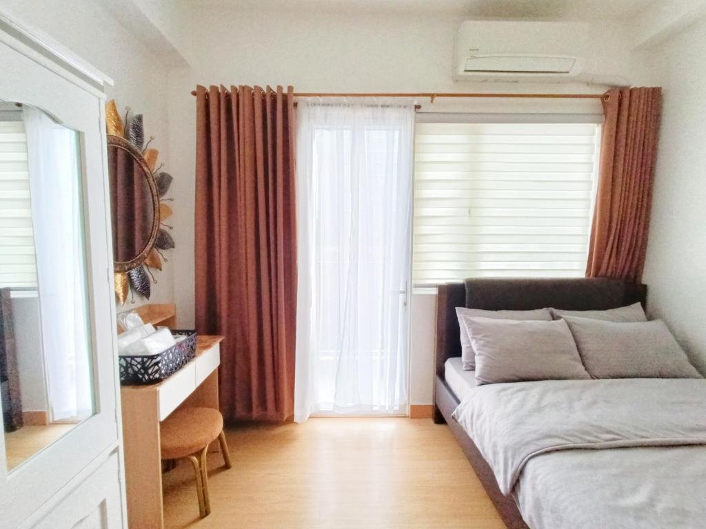 Escape to Urban Serenity: Your Cozy Haven at Trees Residences