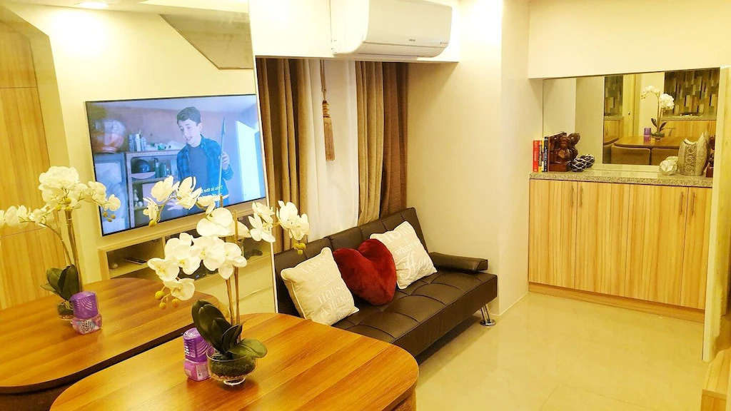 Staycation QC - 65inch SmartTV w PS4 Netflix Manila Philippines 5 Star Ultimate Reviews and Travel Guide