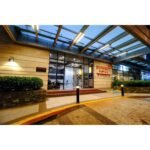 Modern elegant lobby and stylish room interior at Summit Hotel Magnolia in Quezon City, Manila, Philippines, showcasing contemporary boutique hotel design.