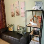 Modern and stylish living room and dining area interior of a fully furnished one-bedroom apartment in Manila, Philippines