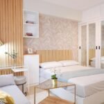 Cozy and modern interior room of a high-rise condo at Manhattan Plaza Tower 1 in Araneta City, Manila, Philippines, featuring a stylish living area, large windows, and a city view.