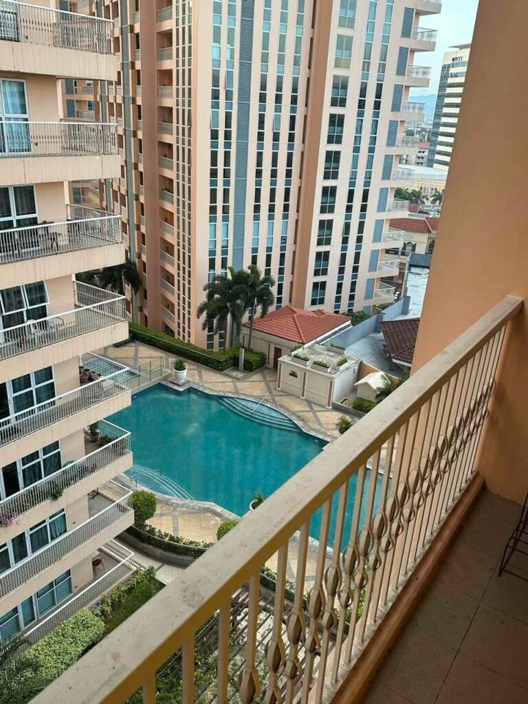 Balcony view from ThePearl Executive Studio at Venice Luxury Residences in Manila Philippines looking down at the scenic Venice Grand Canal layout.
