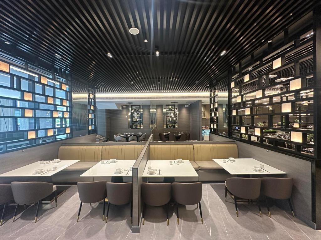Modern and stylish interior of the contemporary in-house dining restaurant near the main lobby at Bayprime Hotel.